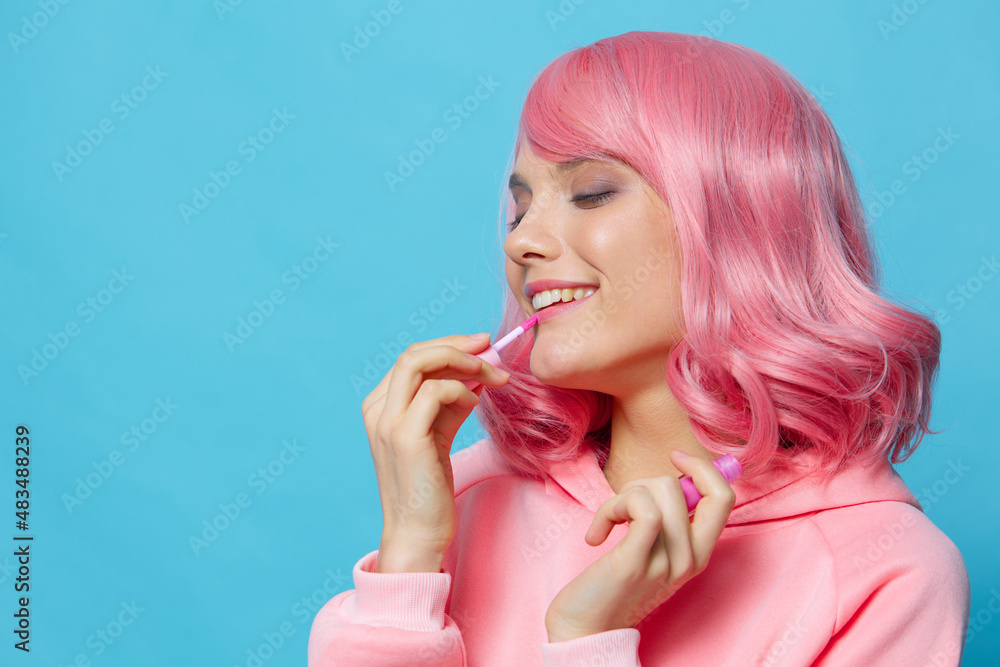 Fototapeta premium young woman with pink hair lipstick makeup Lifestyle fashion