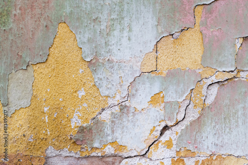 Colorfully painted cement layers background, abstract surface texture photo