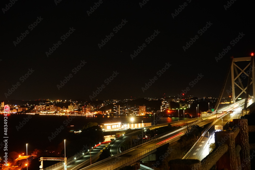 Kanmon Bridge and city view of Moji retro town, in Fukuoka, Kitakyushu, Japan - 北九州 福岡県 門司港の街並み 関門橋 Kanmon Bridge and city view of Moji retro town, in Fukuoka, Kitakyushu, Japan - 北九州 福岡県 門司港の街並み 関門橋