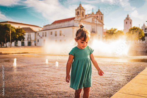 a child is playing in the city from lagos portugal  © Marius