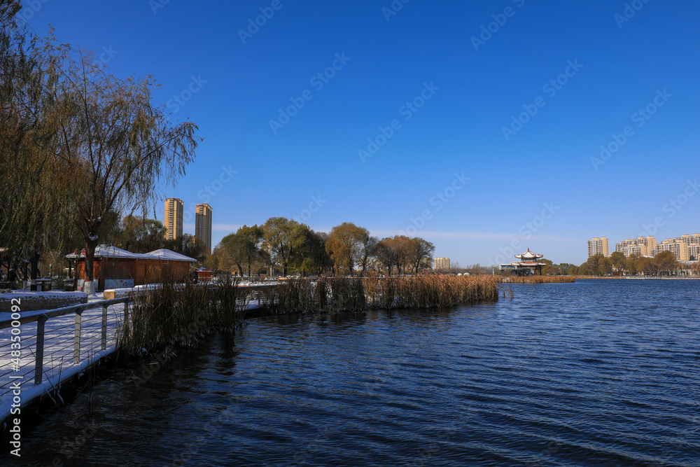 Fototapeta premium Beautiful snow scenery in a park, North China