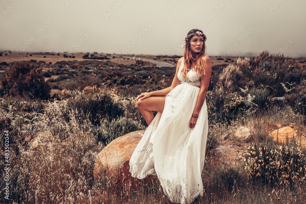 woman in a wedding dress in fanal madeira mountains portugal 