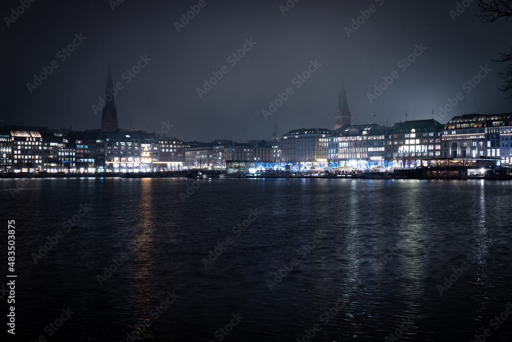 The Alster lake in the city center of Hamburg by night - street photography