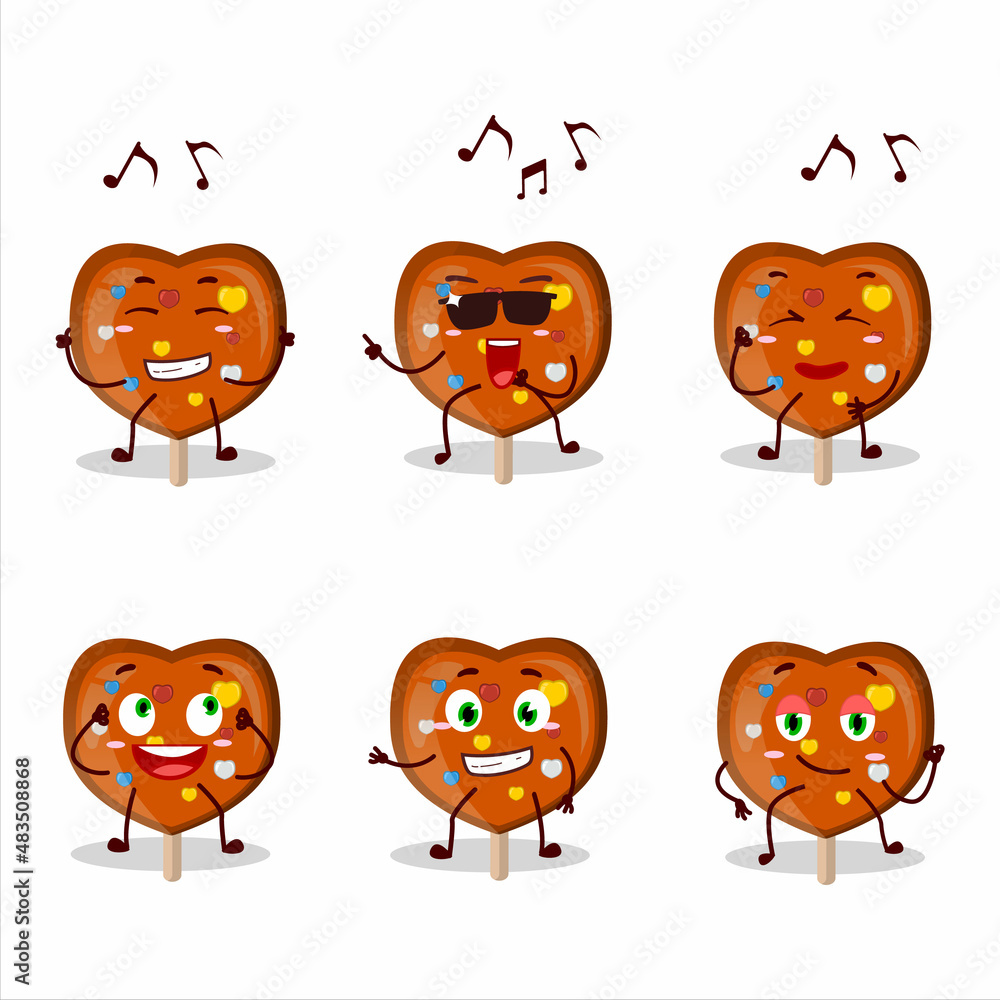 An image of orange lolipop love dancer cartoon character enjoying the music An image of orange lolipop love dancer cartoon character enjoying the music