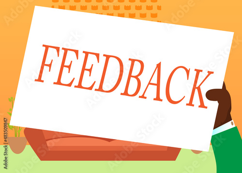 Hand holding up a banner with Feedback text. Showing billboard banner, sign.