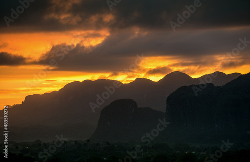 Aerial View across the Vinales Valley in Cuba. Morning twilight and fog. Fog at dawn in the Valley of Vinales in Pinar del Rio, famous for tobacco plantations in Cuba, world heritage site of Unesco