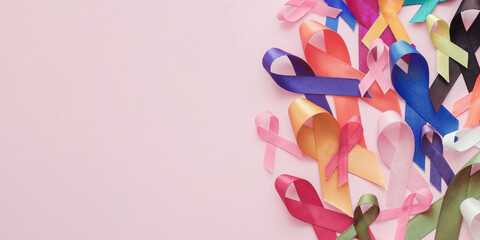 all ribbons on pink background, cancer awareness, World cancer day, world autism awareness day, autism spectrum concept