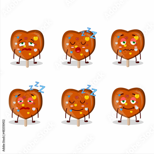 Fototapeta Naklejka Na Ścianę i Meble -  Cartoon character of orange lolipop love with sleepy expression