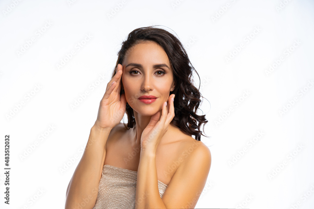 close-up portrait of a woman. beauty industry. personal care. the girl in the studio shows the zones on the face. isolated white background