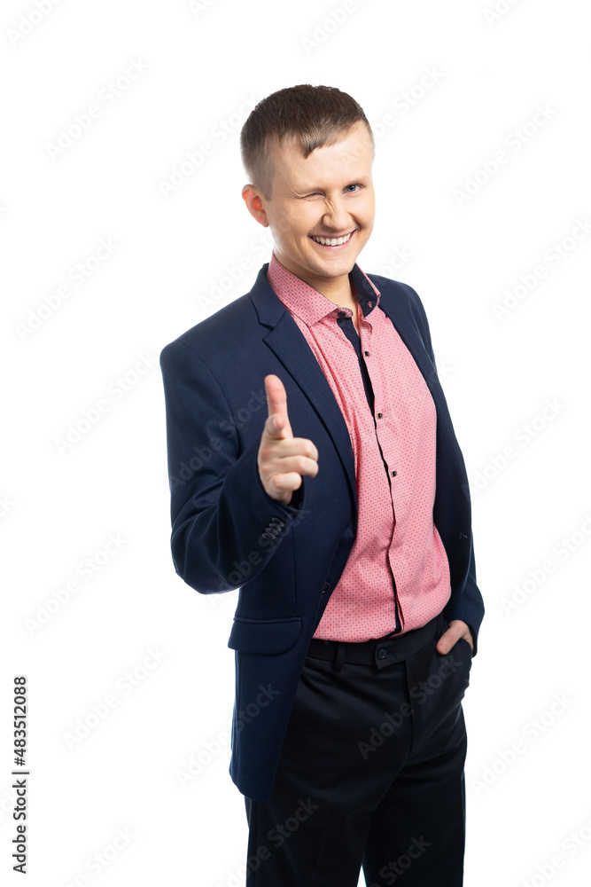 isolated. cheerful man in a business suit winked and pointed a finger at us isolated. cheerful man in a business suit winked and pointed a finger at us