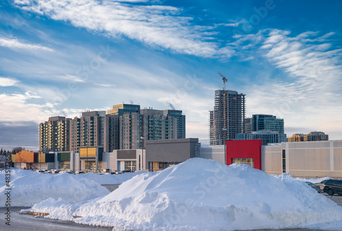 Snowy hills in a modern suburban Canadian city