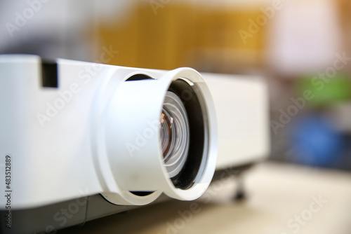 Close-up computer projector on table boardroom or meeting room technology equipment of visual or visualizer for presentation interview or classroom meets tool.