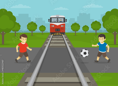 Railroad safety rules and tips. Do not play on or near railway tracks . Male little kids are playing football at level crossing. Flat vector illustration template.