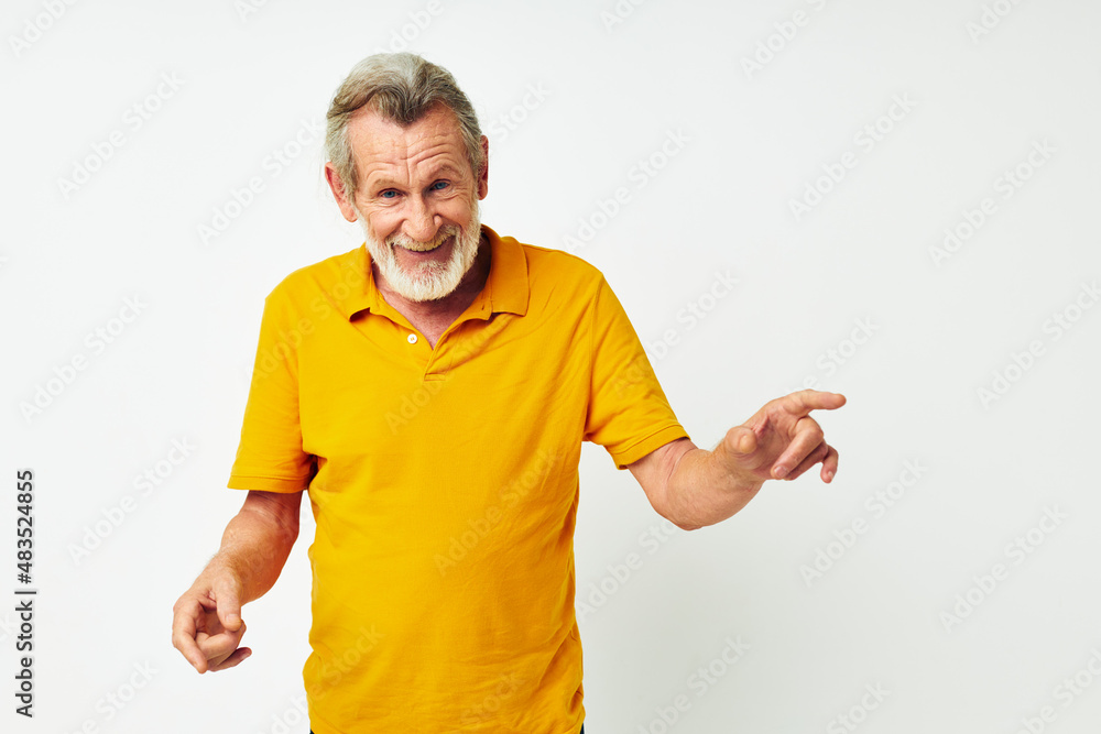 Senior grey-haired man with a gray beard emotion gestures hands cropped view Senior grey-haired man with a gray beard emotion gestures hands cropped view