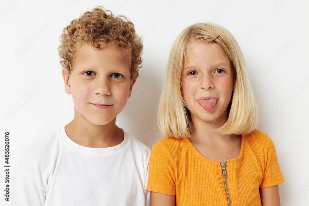 cheerful children casual clothes posing emotions studio isolated background unaltered cheerful children casual clothes posing emotions studio isolated background unaltered