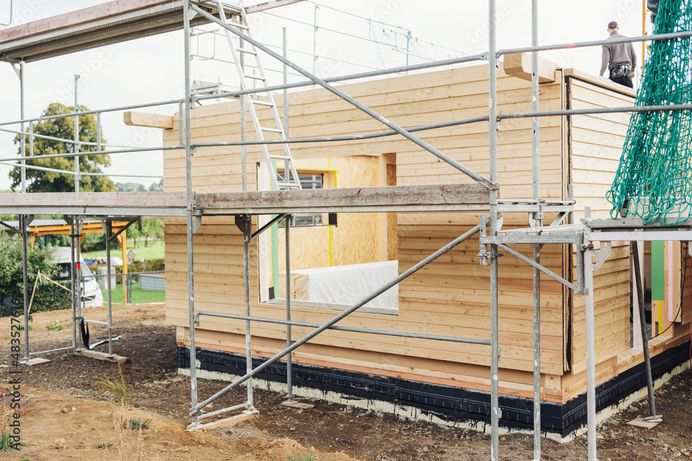 Prefabricated wooden wall on new build house Prefabricated wooden wall on new build house