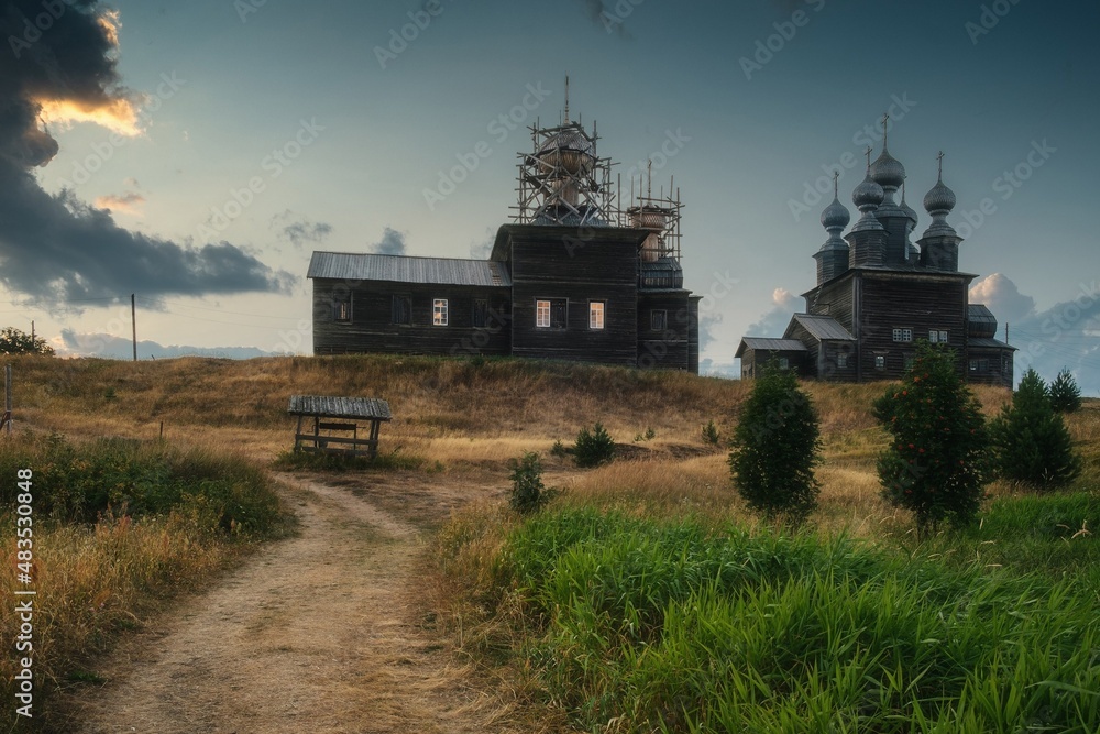 Fototapeta premium old wooden church in the field