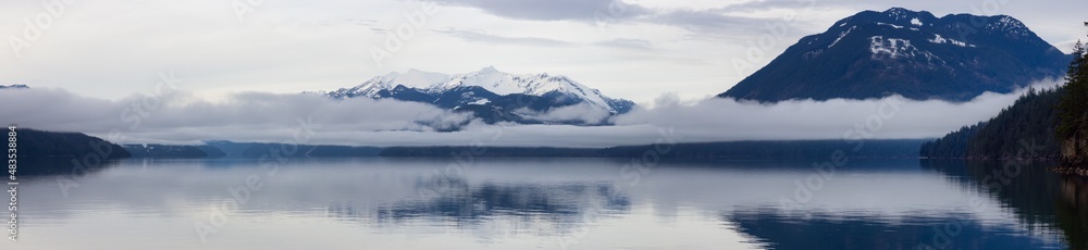 Panoramic view of Harrison Lake with mountains in background. Canadian Nature Background Panorama. British Columbia, Canada.
