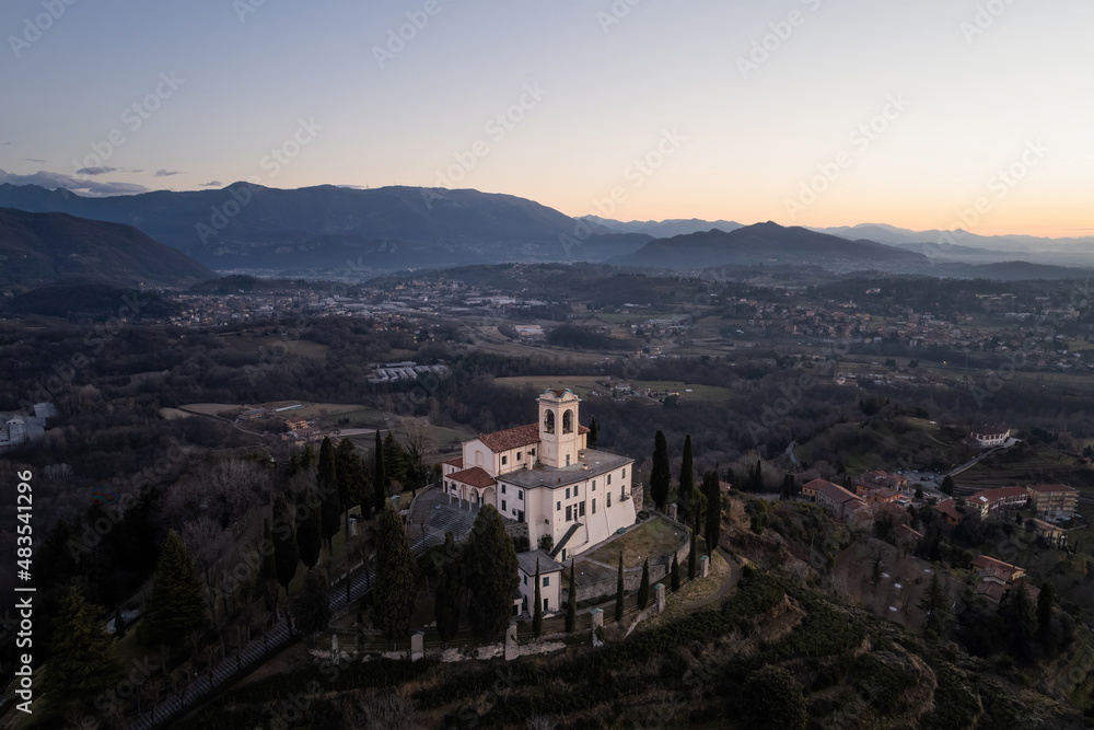 View over Montevecchia sanctuary and Lecco valley at morning.