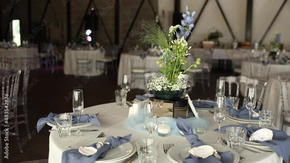 festive table in a restaurant with decor for a wedding festive table in a restaurant with decor for a wedding