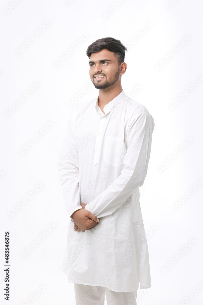 Indian man in tradition wear and giving expression on white background. Indian man in tradition wear and giving expression on white background.