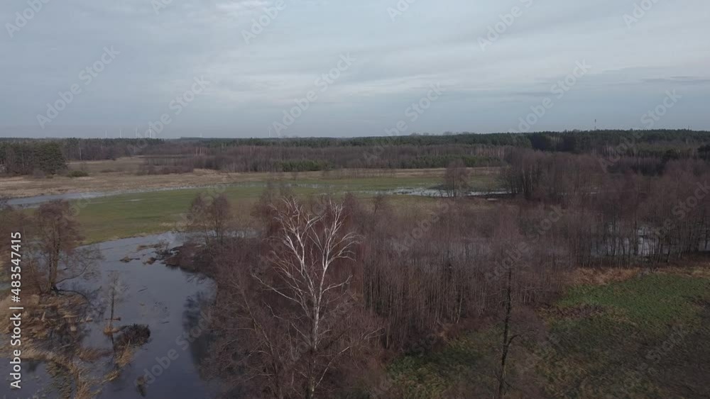 Winter without snow on a river Grabia in central Poland. Winter without snow on a river Grabia in central Poland.