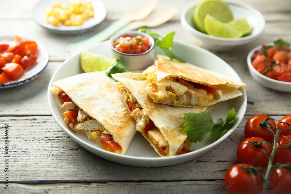 Homemade quesadilla with chicken and tomatoes