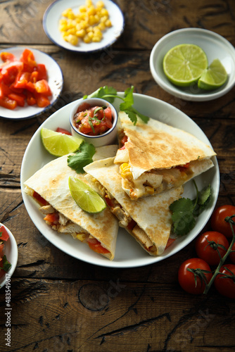 Homemade quesadilla with chicken and tomatoes © marysckin