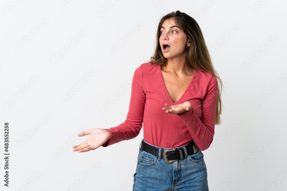 Young caucasian woman isolated on white background with surprise expression while looking side Young caucasian woman isolated on white background with surprise expression while looking side