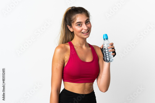 Young caucasian woman isolated on white background with sports water bottle