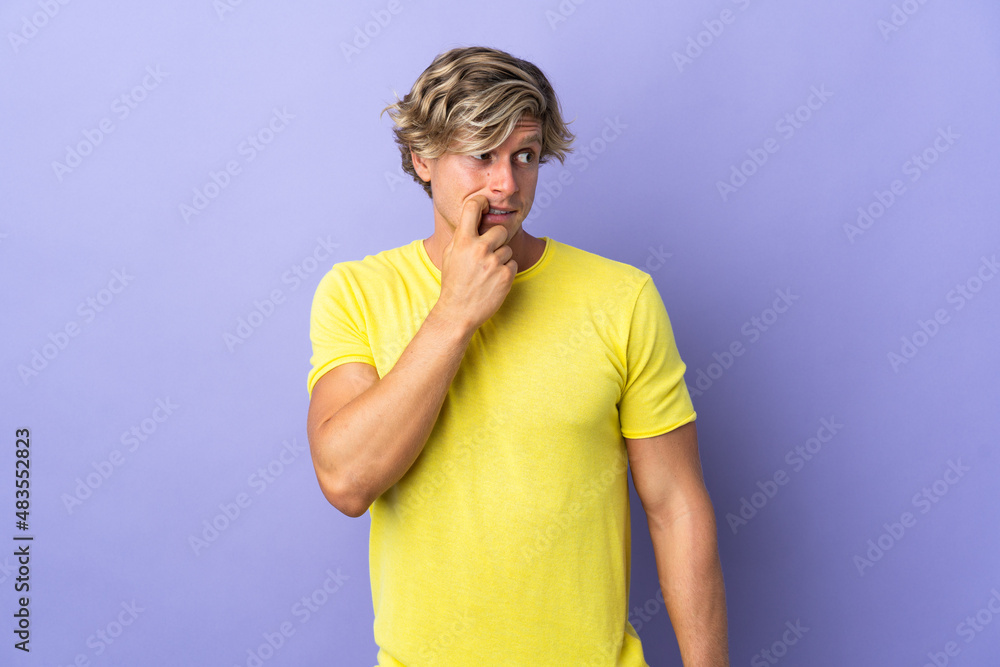 English man over isolated purple background nervous and scared English man over isolated purple background nervous and scared