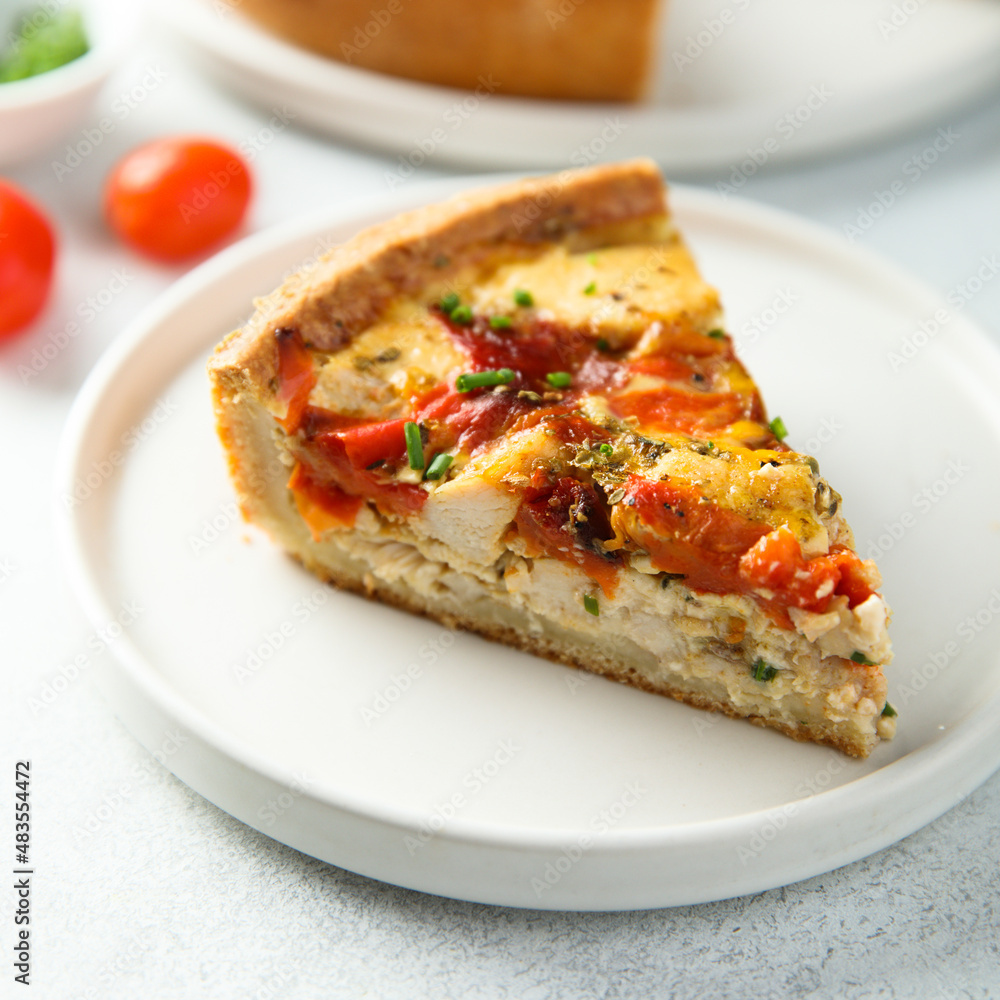 Homemade chicken quiche with tomatoes and pepper Homemade chicken quiche with tomatoes and pepper