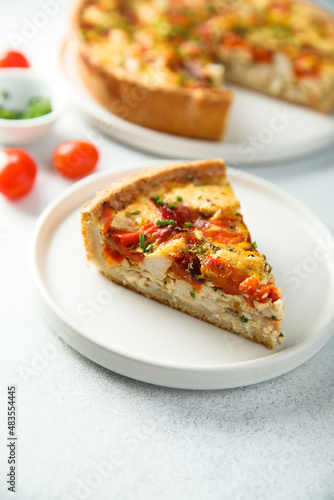 Homemade chicken quiche with tomatoes and pepper