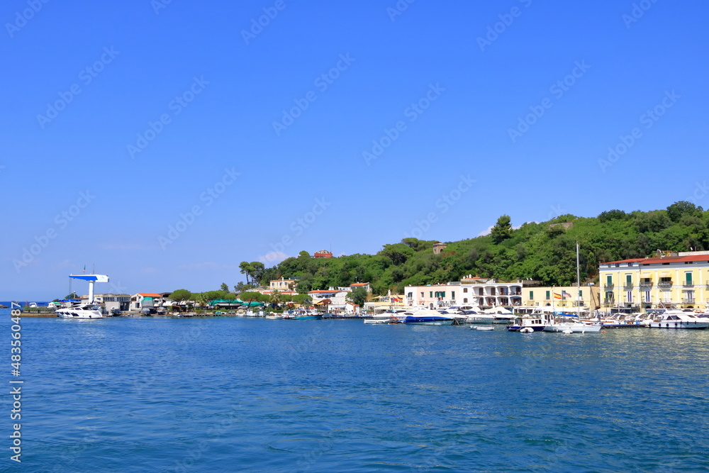 Ischia port cityscape, harbor with boats