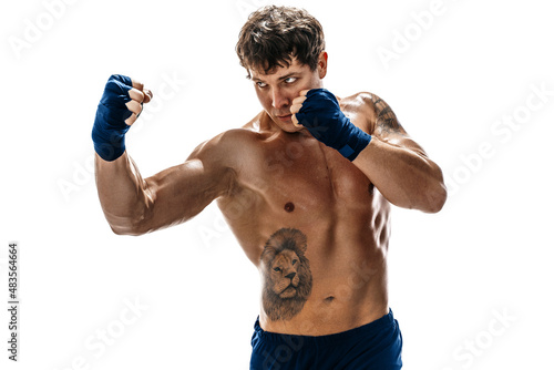 Half length of male boxer who training and practicing uppercut on white background. sport concept 