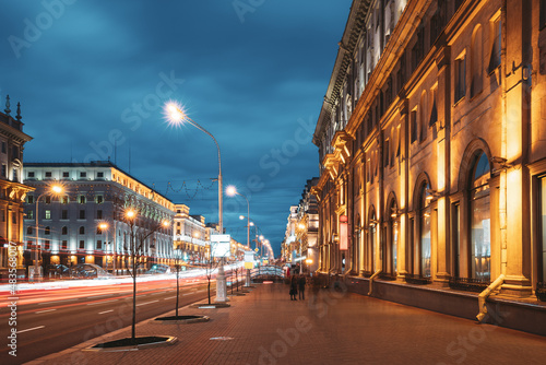 Minsk, Belarus. Traffic On Independence Avenue In Evening Night Illuminations. photo