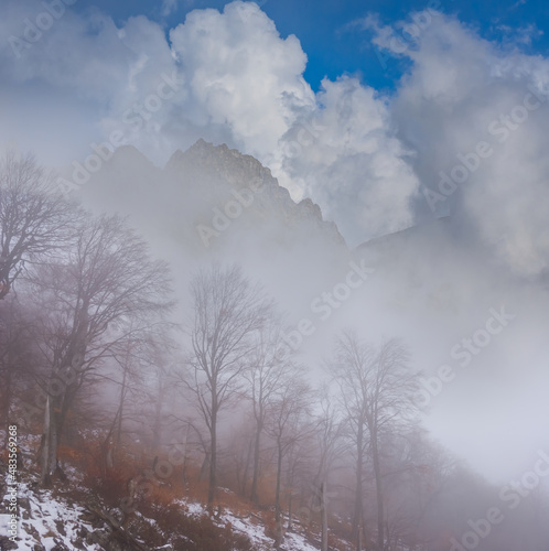 mount slope in mist and dense clouds