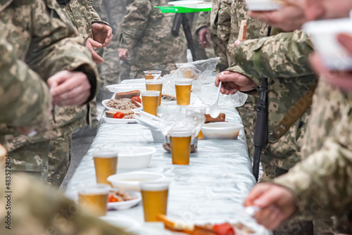 Photography imported food for soldiers outdoors during exercises.