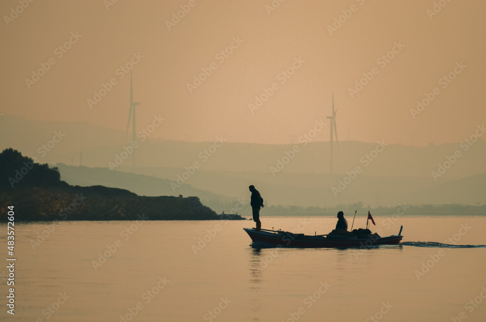 boat fisherman silhouette standing shadow