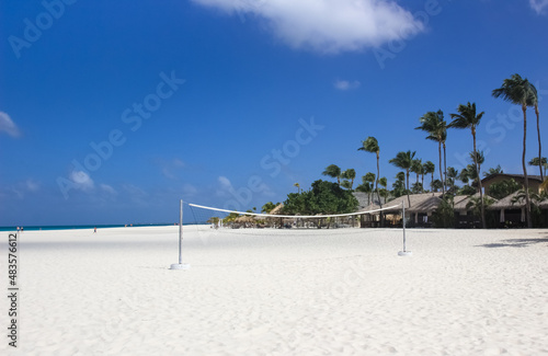 White sand Aruba beach with volleyball net