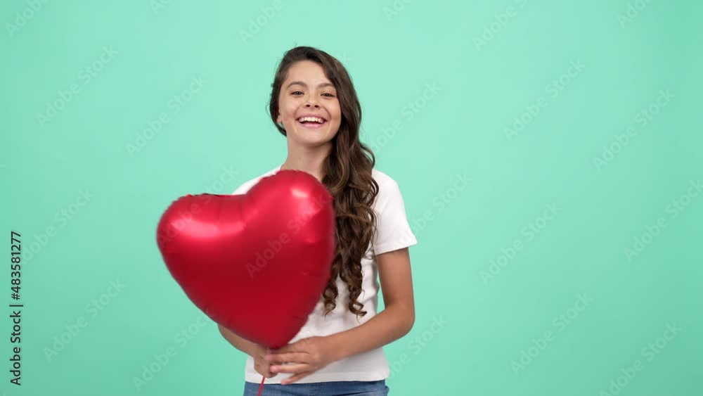 happy child portrait showing red heart party balloon with peace gesture, sweetheart happy child portrait showing red heart party balloon with peace gesture, sweetheart