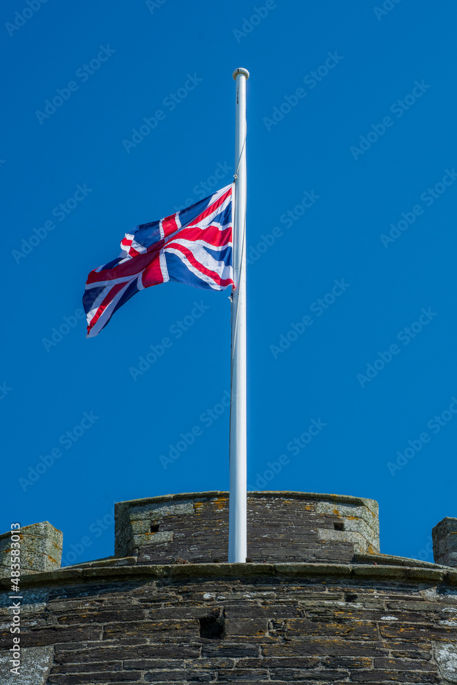 The U.K. country flag on a pole