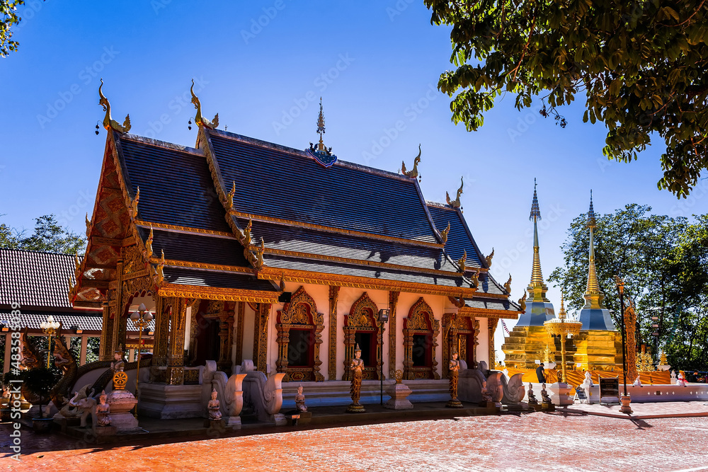 Chiang Rai, Thailand - January, 09, 2021 : Wat Phra That Doi Tung is a beautiful golden temple in Chiang Rai province, Thailand.