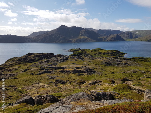 ocean and mountain landscape on a sunny summer day in northcape county © Arcticphotoworks