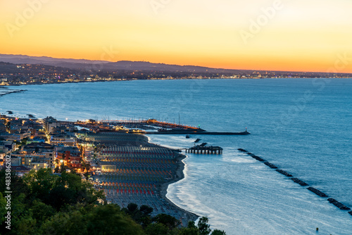Sunset time in Gabicce Monte, amazing view on all the Riviera Romagnola beach  photo