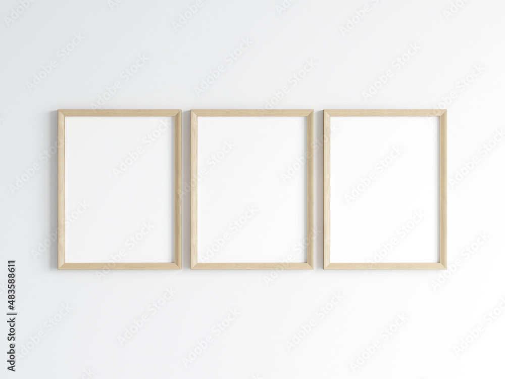 Three wooden frames on the wall, poster mockup, print mockup, 3d render Three wooden frames on the wall, poster mockup, print mockup, 3d render
