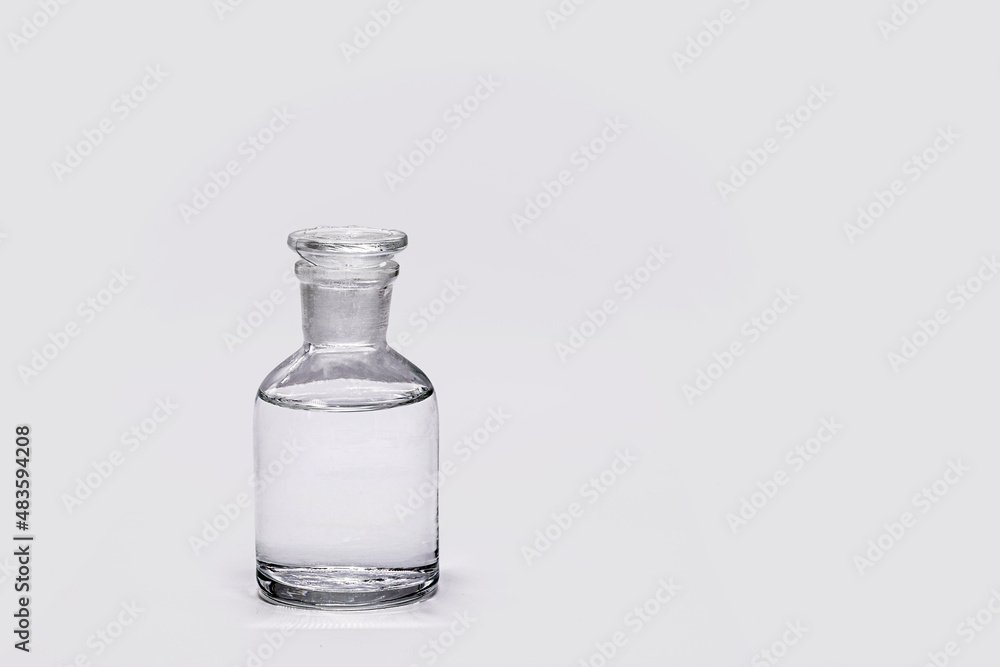 Reagent bottle with stopper Glass, isolated on white background Reagent bottle with stopper Glass, isolated on white background