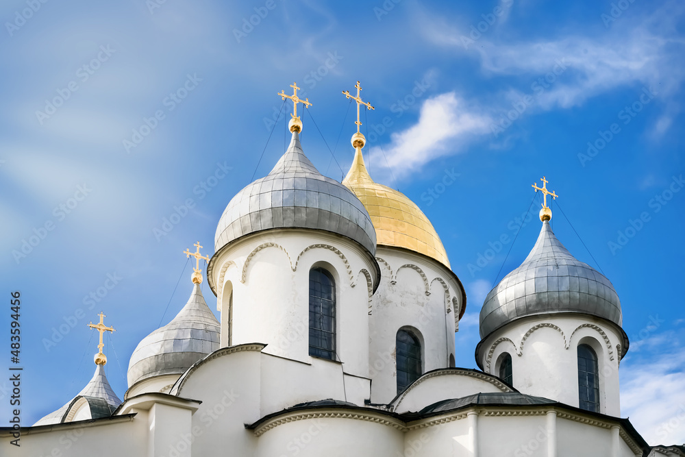 The domes of the Orthodox Church against the blue sky. Russia
