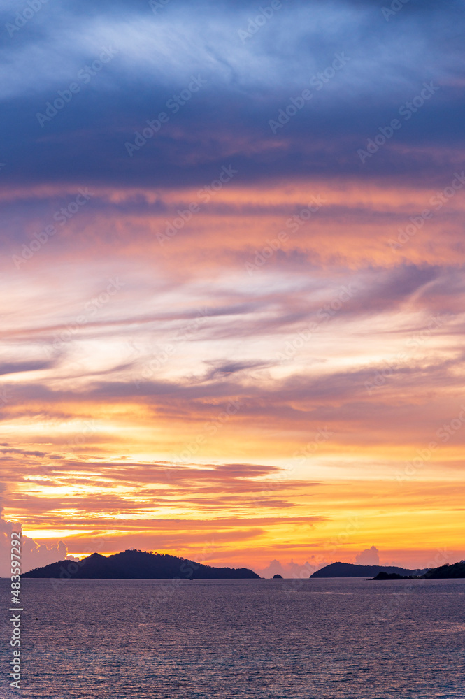 sunset or sunrise seascape on koh Lipe isaland with gold lighting sunset sky background