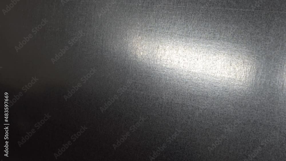 Glide view of aluminium stainless steel titanium metal background texture Glide view of aluminium stainless steel titanium metal background texture